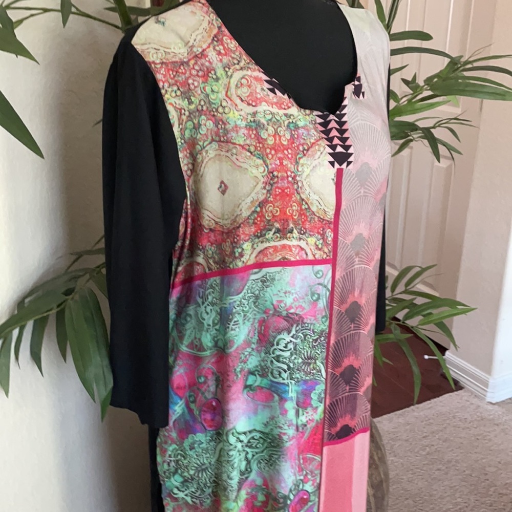 This is a top that has splits on both sides of it,